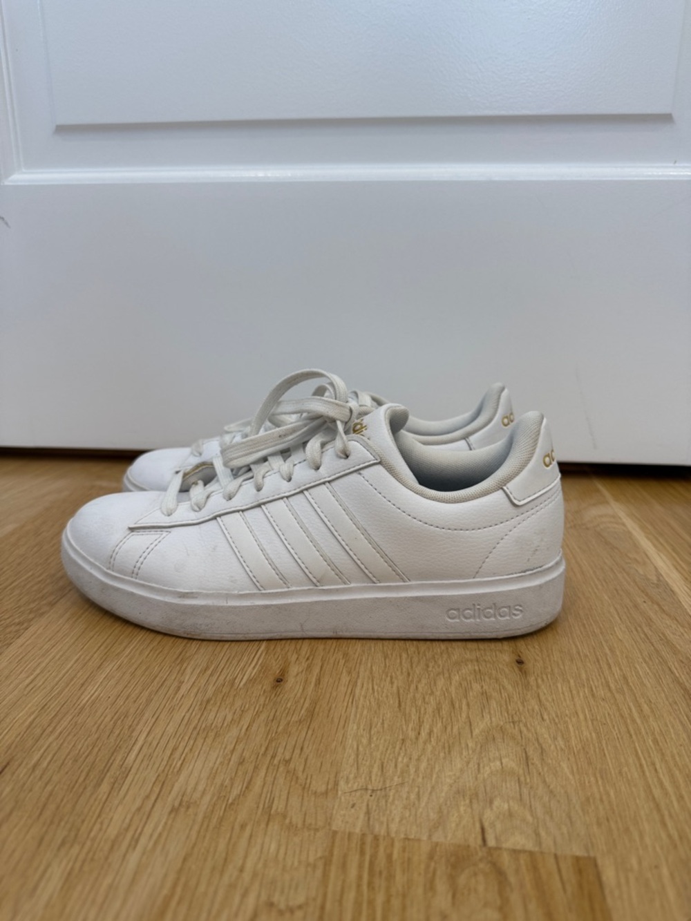 adidas Off-White Leather Low-Top Sneakers with Gold Accents